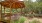 Wooden pavilion aside play park at 700 Riverchase Apartments near Birmingham, AL
