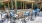 Outdoor Kitchen with Deluxe Grilling Stations, Bar and Dining Area at 700 Riverchase Apartments in Hoover, AL