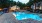Sunset at the resort-style pool at 700 Riverchase Apartments near Birmingham, AL
