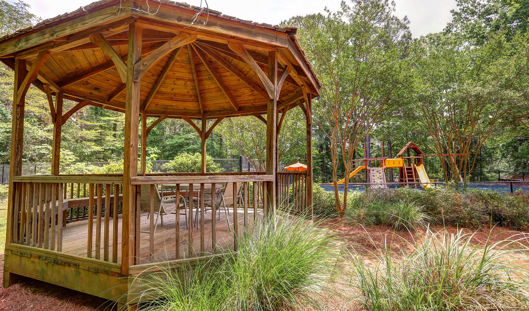 Gazebo gazebo with playground in foreground